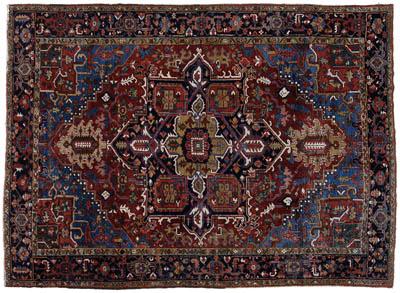 Appraisal: Heriz rug central medallion on brick red field with olive