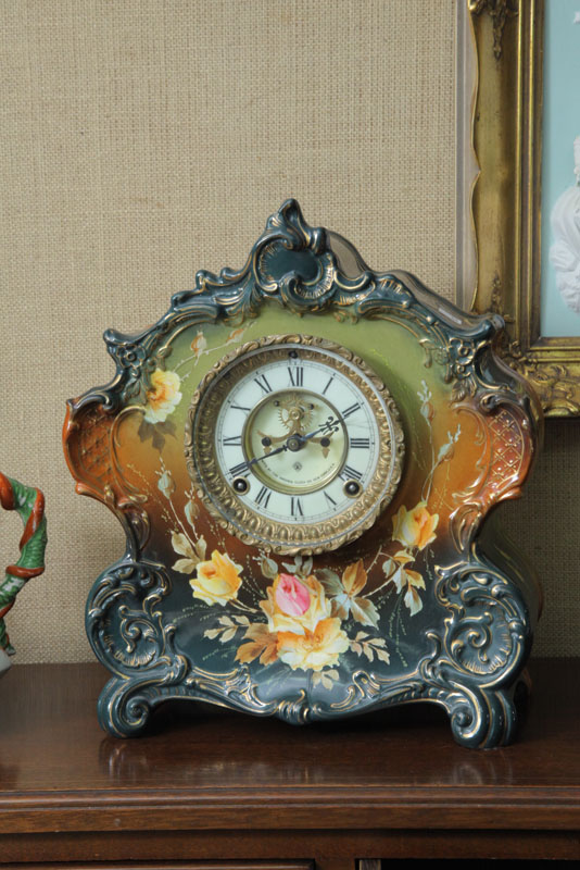 Appraisal: CHINA MANTLE CLOCK Royal Bonn cased clock with Ansonia movement