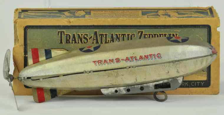 Appraisal: TRANS-ATLANTIC ZEPPELIN WITH BOX Louis Marx boxed example tin dirigible