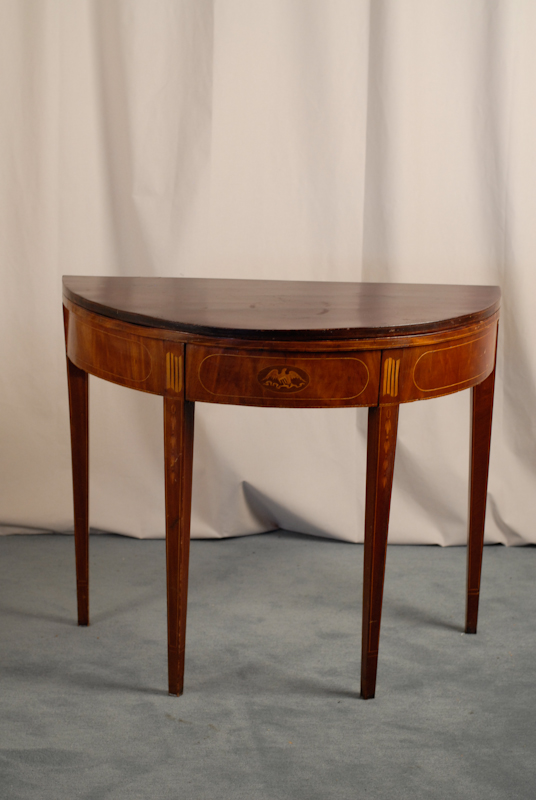 Appraisal: A Federal-style Folding-top Card Table demilune of mahogany and mahogany