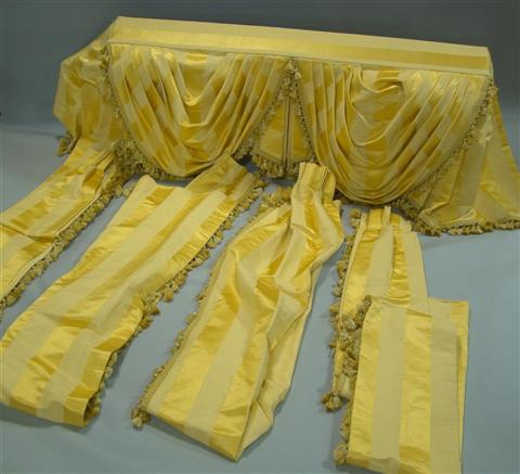 Appraisal: PAIR YELLOW WIDE STRIPE TASSEL TRIMMED SWAG AND JABOT VALANCES