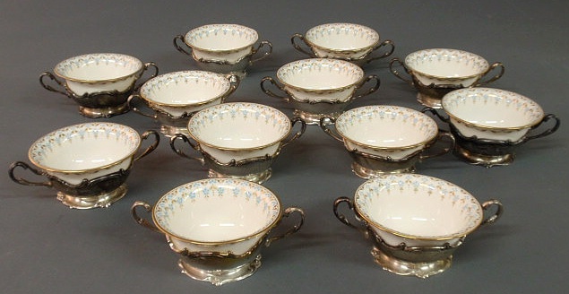 Appraisal: Set of twelve Lenox bouillons with sterling silver double-handled bases