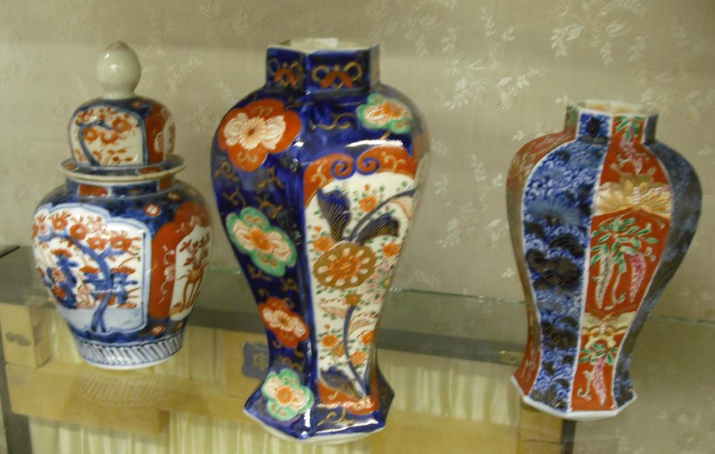 Appraisal: Japanese Imari jar and cover decorated with reserves of flowers