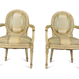 Appraisal: A Pair of Painted Louis XVI Style Painted Fauteuils TH