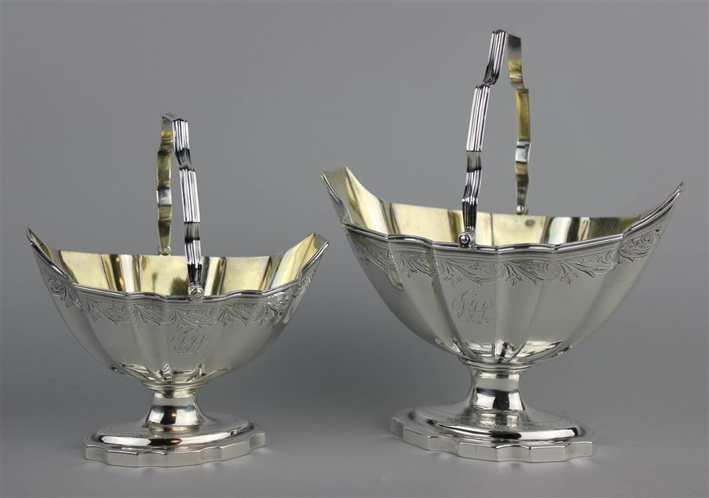 Appraisal: TWO SIMILAR GEORGE III SILVER SUGAR BASKETS London and each