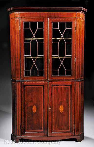 Appraisal: An English Inlaid Mahogany Corner Cupboard th c stepped cornice