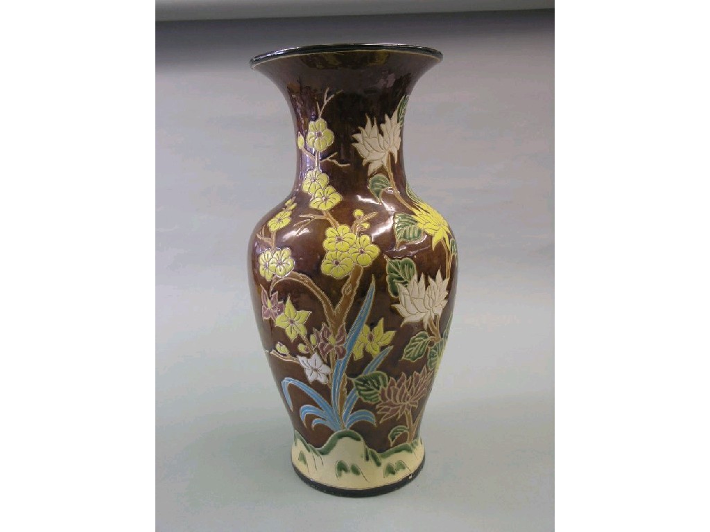 Appraisal: A Chinese earthenware baluster vase painted with flowers predominantly in