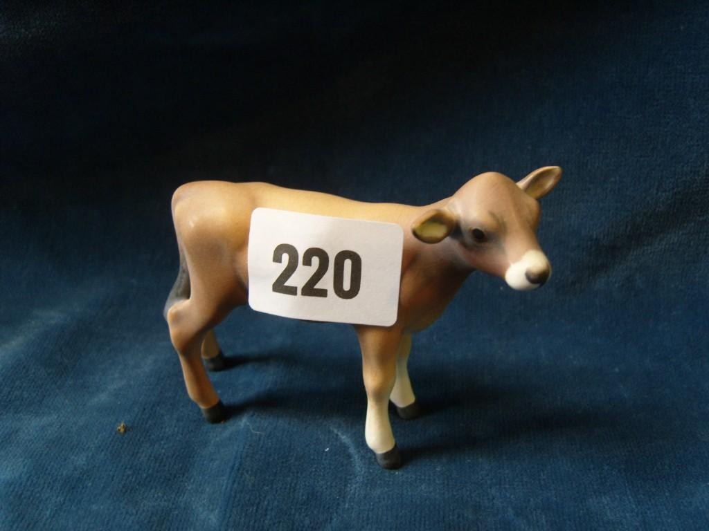 Appraisal: A Beswick matt glazed model of a Guernsey calf -