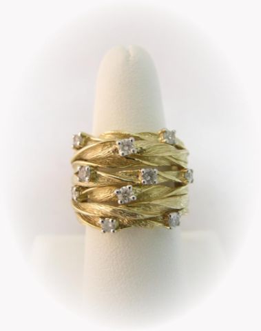 Appraisal: K yellow gold diamond fashion ring with ten round brilliant