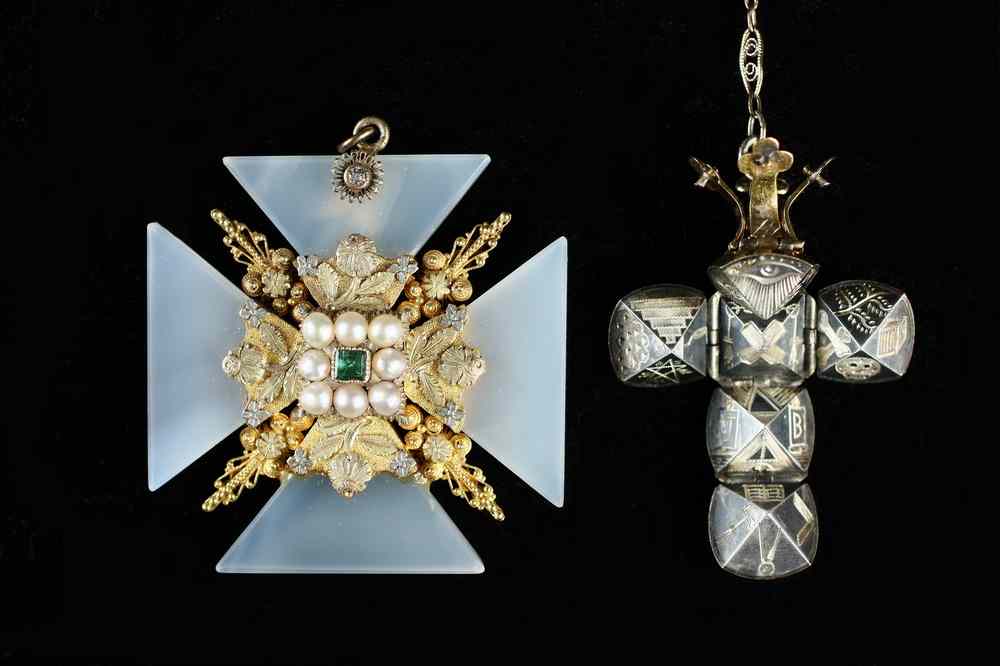 Appraisal: PENDANTS - The first a Maltese cross with hair reliquary