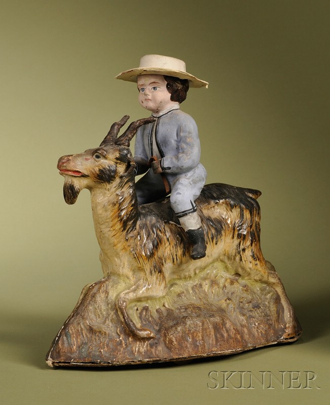 Appraisal: Rare Boy Riding Goat Pull-Toy Germany c molded papier-mache running