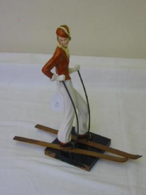 Appraisal: AN ART DECO POTTERY FIGURE in the Lenci style modelled