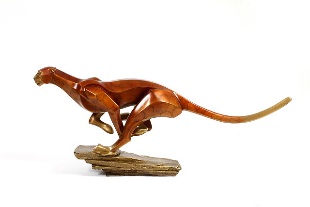 Appraisal: A CONTEMPORARY PATINATED BRASS SCULPTURE of a running jaguar cm