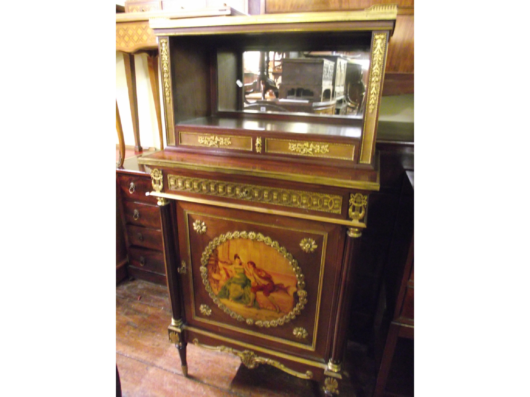 Appraisal: A late th century French side cabinet the lower section