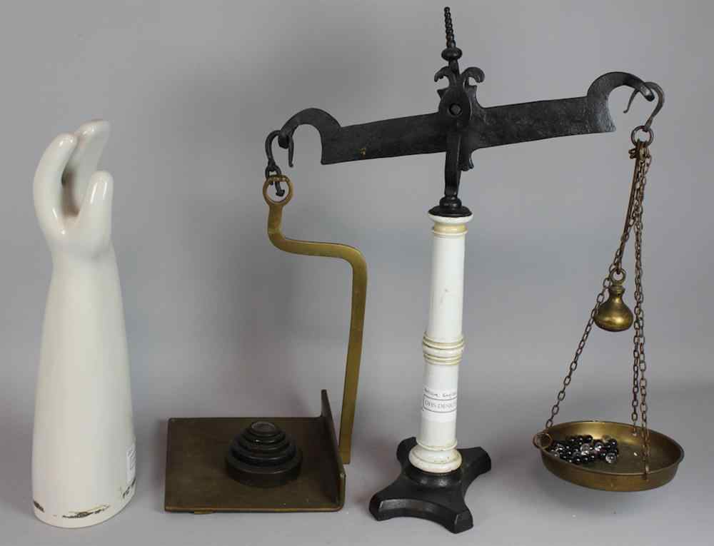 Appraisal: ENGLISH IRON BRASS SCALE AND A CONTEMPORARY HAND ORNAMENT with