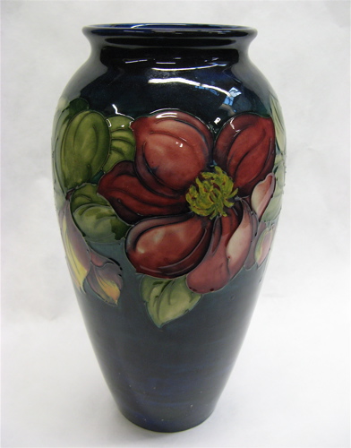 Appraisal: MOORCROFT ART POTTERY VASE H in the Anenome pattern purple