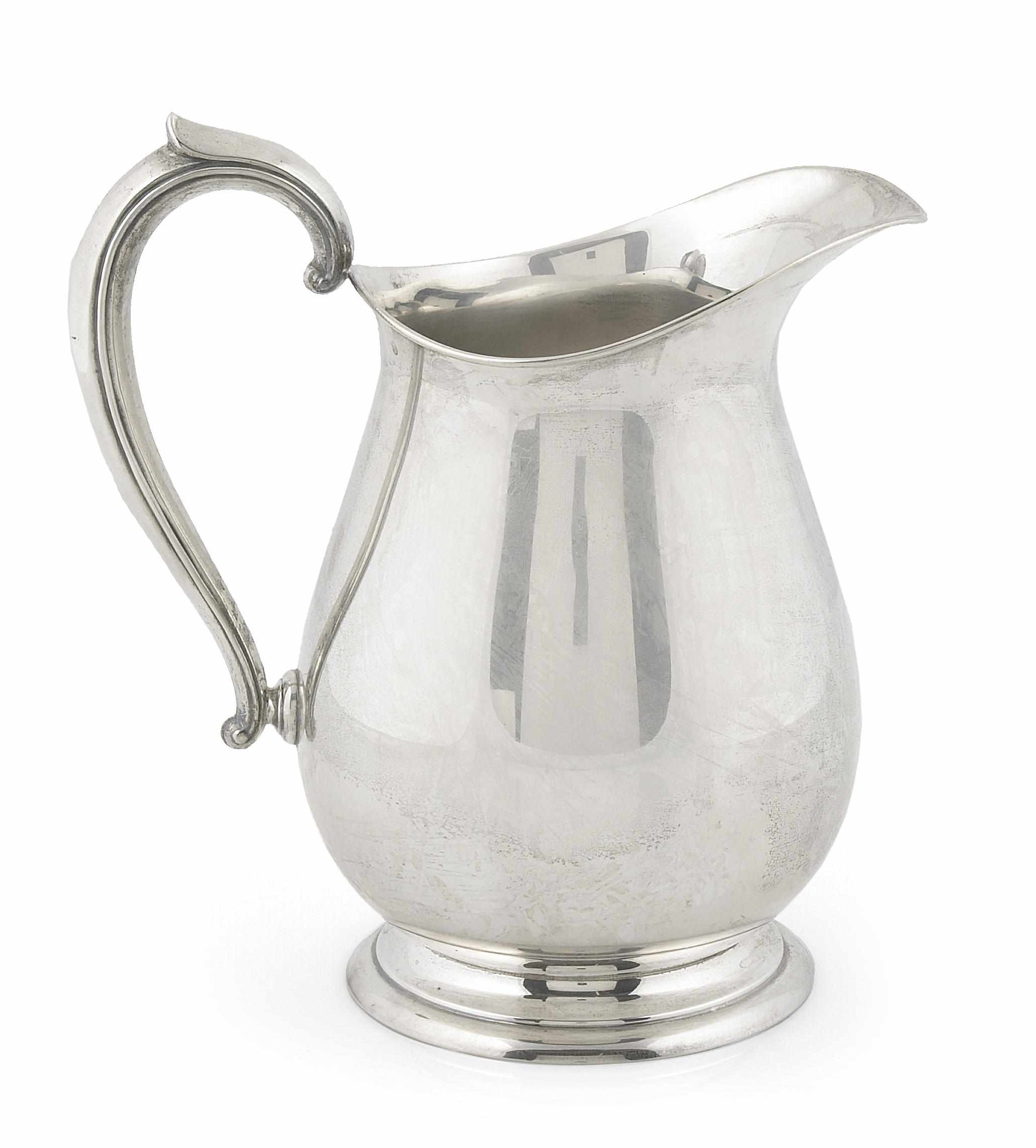 Appraisal: An American sterling silver water pitcher Fisher Silversmiths Inc Jersey