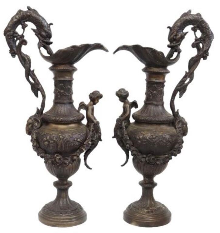 Appraisal: pair Neoclassical style patinated bronze ewers th c dolphin-form handle