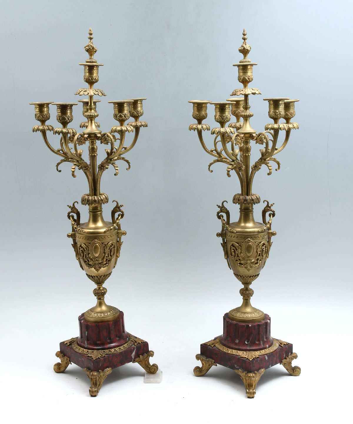 Appraisal: PAIR OF LIGHT GILT BRONZE CANDELABRAS Having an overall scrolling