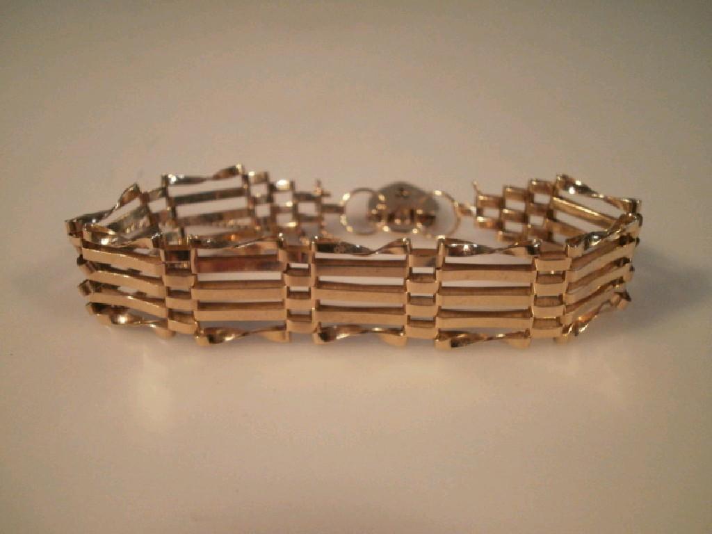 Appraisal: A five bar gate bracelet in ct gold g