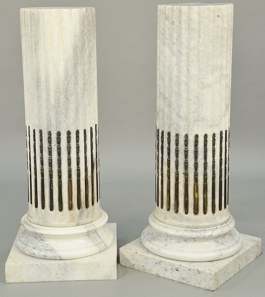 Appraisal: Pair of White Marble Pedestals column style with brass stop