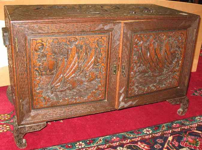 Appraisal: CARVED CAMPHOR CHEST Chinese c 's the case exterior featuring