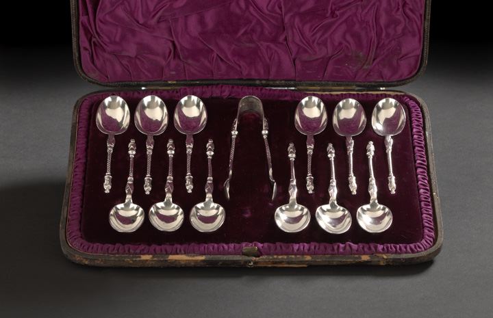 Appraisal: Victorian Thirteen-Piece Cased Sterling Silver Teaspoon and Sugar Tong Set