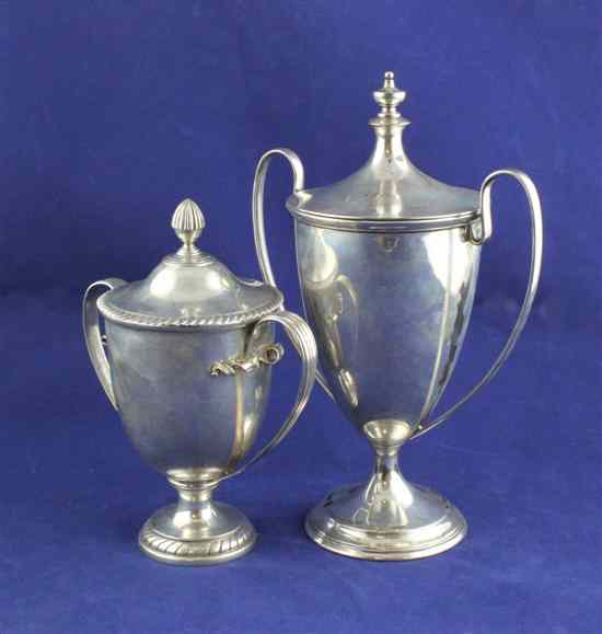 Appraisal: An Edwardian silver two handled trophy cup and cover with