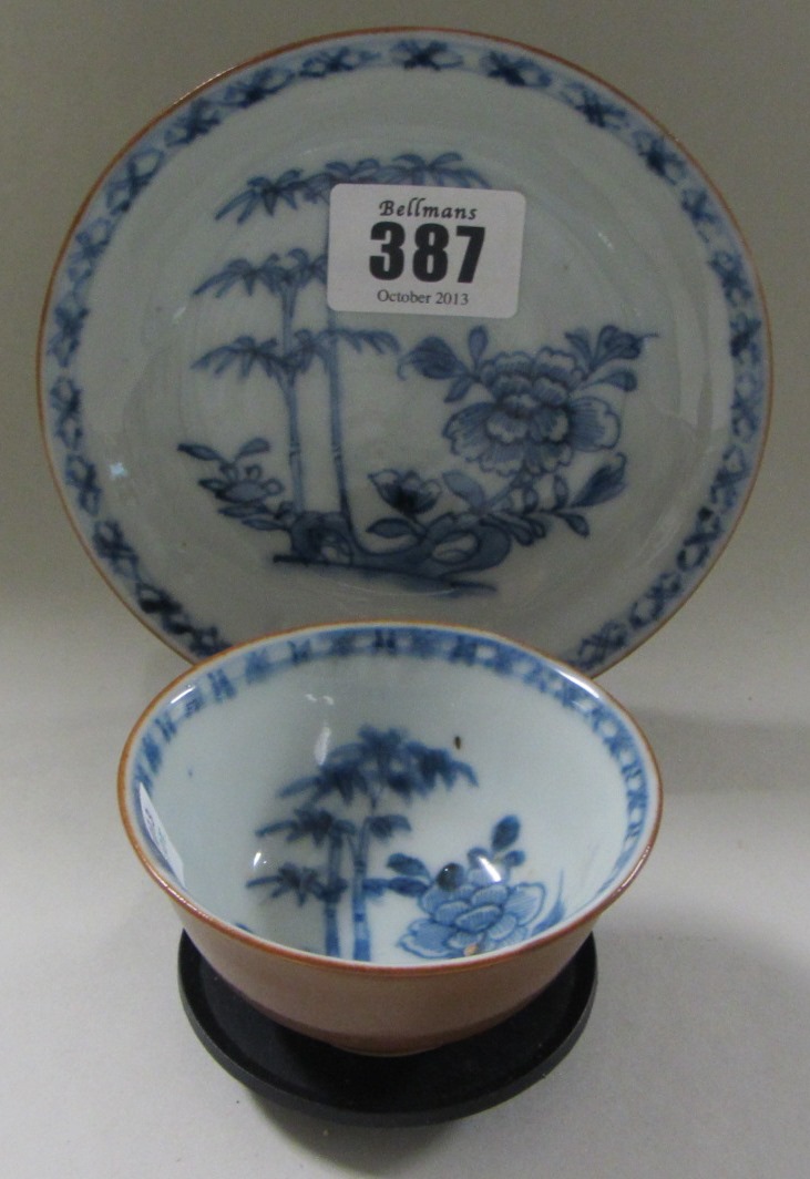 Appraisal: A Nanking Cargo Batavian ware blue and white teabowl and