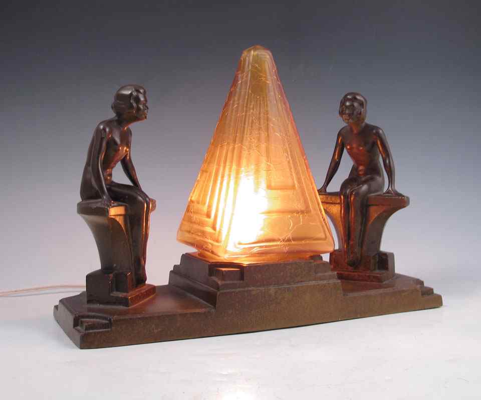 Appraisal: NUART ART DECO NUDE FIGURAL LAMP Bronzed finish cast metal