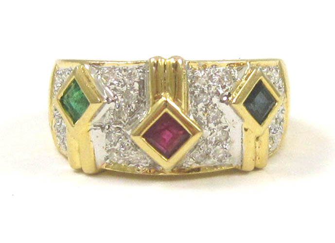 Appraisal: EMERALD SAPPHIRE RUBY AND DIAMOND RING The k gold ring