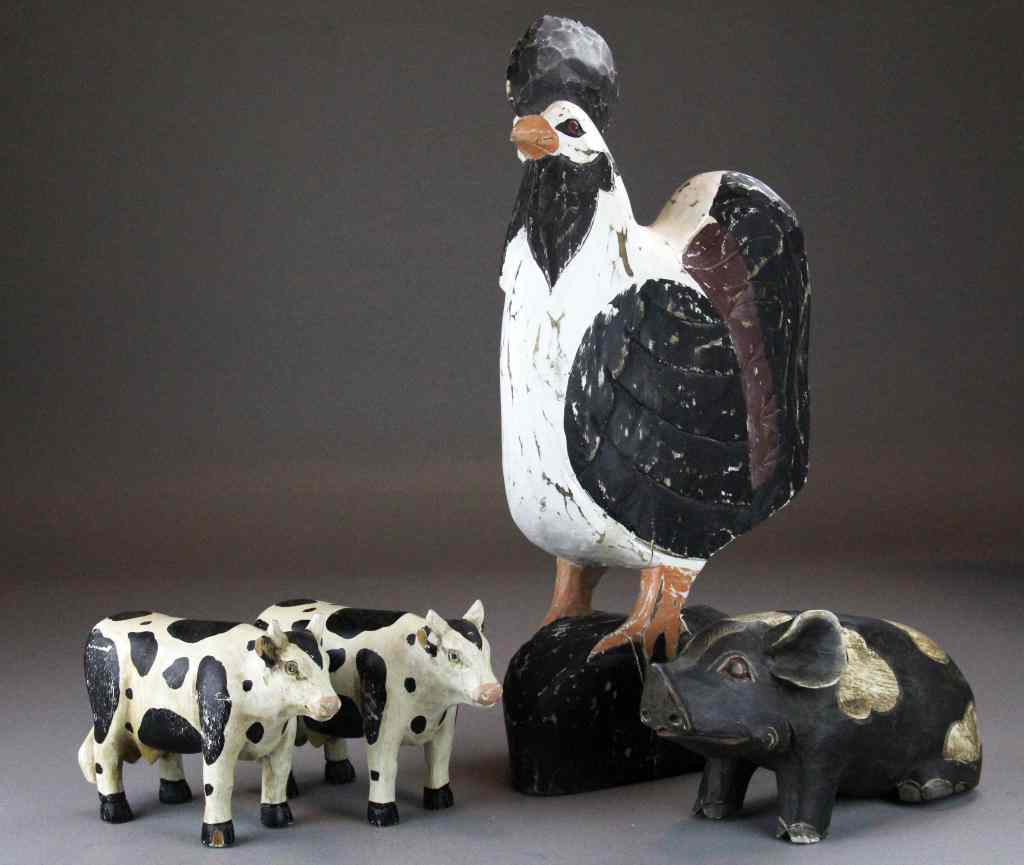 Appraisal: Folk Art CarvingsDepicting a rooster two cows and a pig