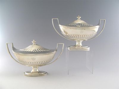 Appraisal: A pair of George III boat-shaped sauce tureens and covers