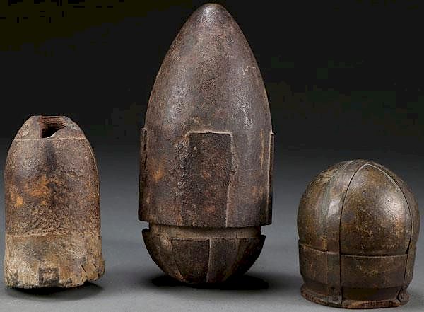 Appraisal: THREE CIVIL WAR PROJECTILES THREE CIVIL WAR PROJECTILES Comprising a