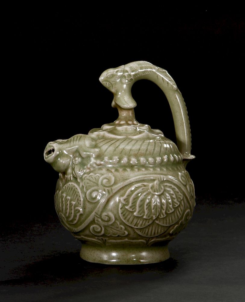 Appraisal: Carved Yaozhou Celadon Ewer The globular body mounted with an