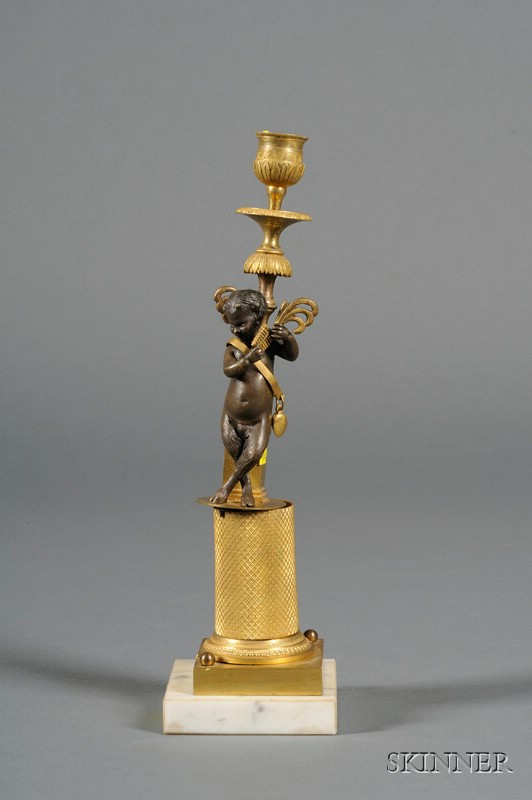 Appraisal: Louis XVI Style Parcel-gilt Bronze Figural Candlestick late th century