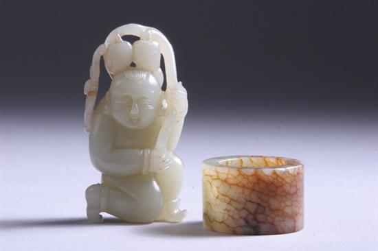 Appraisal: TWO CHINESE CELADON JADE CARVINGS Boy carrying fruit and archer