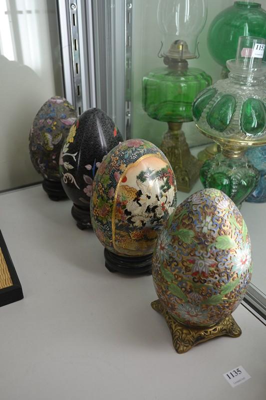 Appraisal: FOUR DECORATIVE EGGS INCL ONE SATSUMA AND THREE CLOISSONE