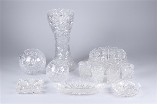 Appraisal: ELEVEN PIECES CUT GLASS th century Tall vase four glasses