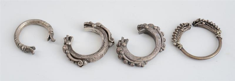 Appraisal: FOUR ASIAN SILVERED METAL BANGLE BRACELETS WITH DRAGON HEADS Approx