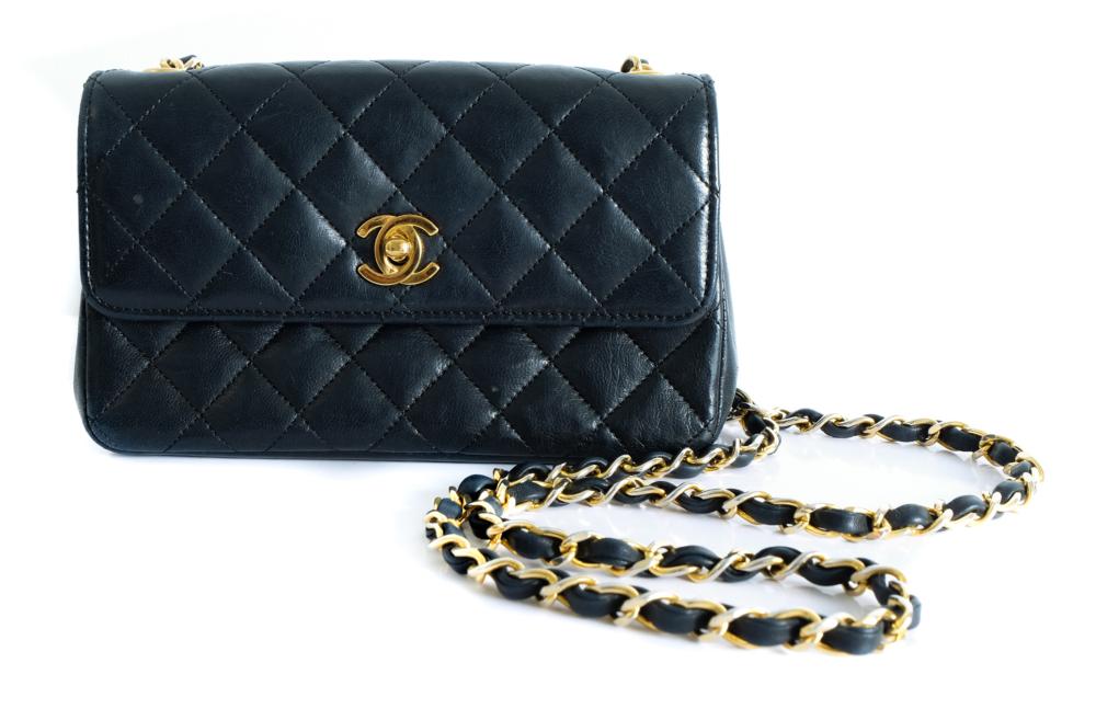 Appraisal: CHANEL BLACK QUILTED LAMBSKIN MINI FLAP BAGChanel quilted black lambskin