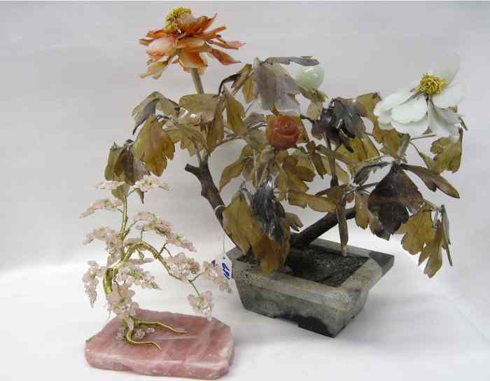 Appraisal: TWO CHINESE ''JADE'' TREES carved carnelian and white hardstone blossoms