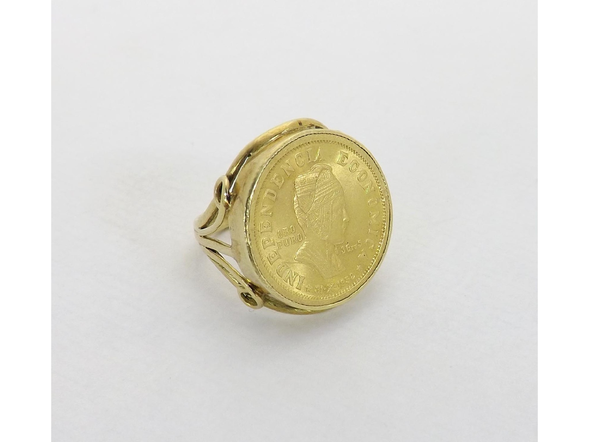 Appraisal: Republica De Bolivia gold coin Bolivianos in a gold ring