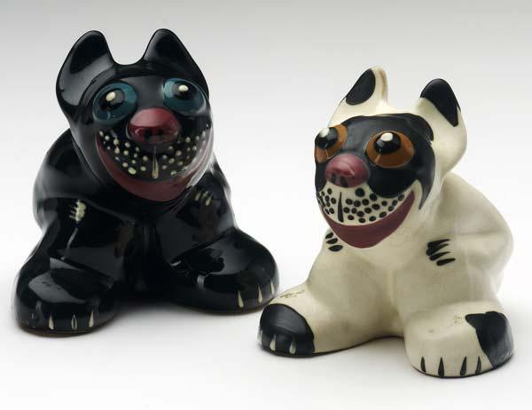 Appraisal: WELLER Two Pop-Eye dogs one in glossy black the other