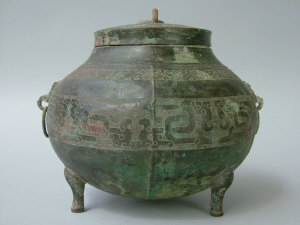 Appraisal: A Chinese bronzed archaic censer and cover of squat rounded