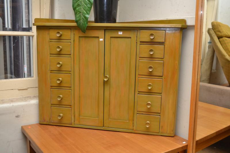 Appraisal: A LIME PAINTED PINE CORNER CABINET A LIME PAINTED PINE