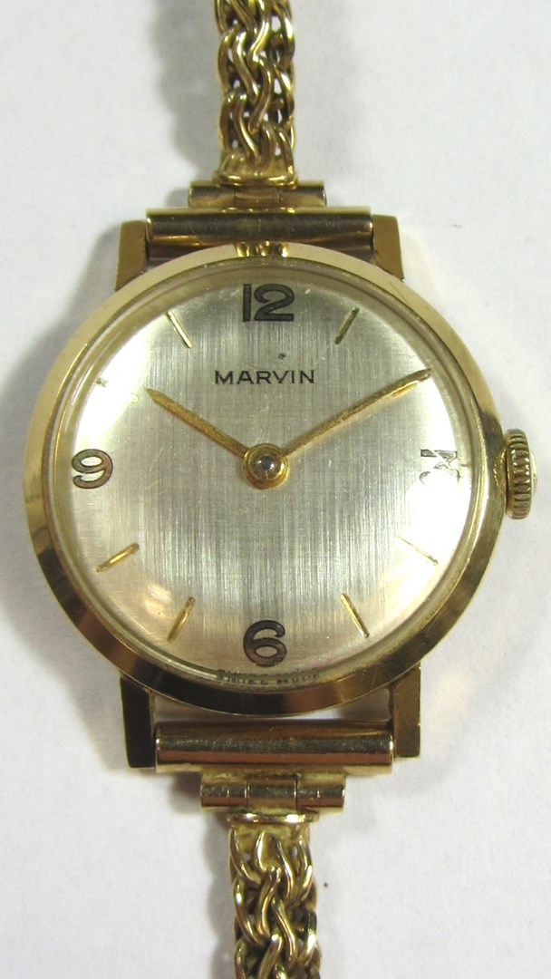 Appraisal: A ladies ct gold circular cased Marvin wristwatch with a