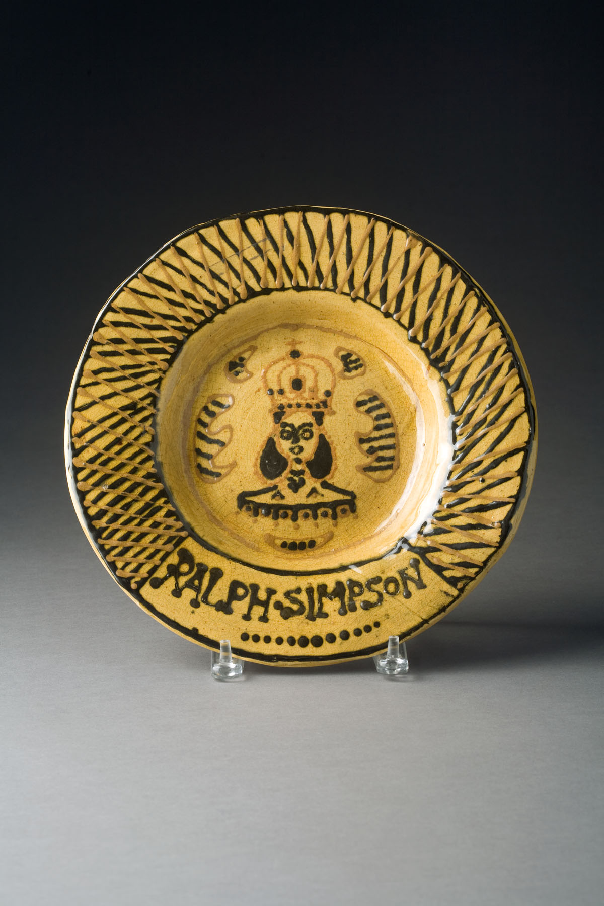 Appraisal: ENGLISH SLIPWARE DISH IN THE MANNER OF RALPH SIMPSON The