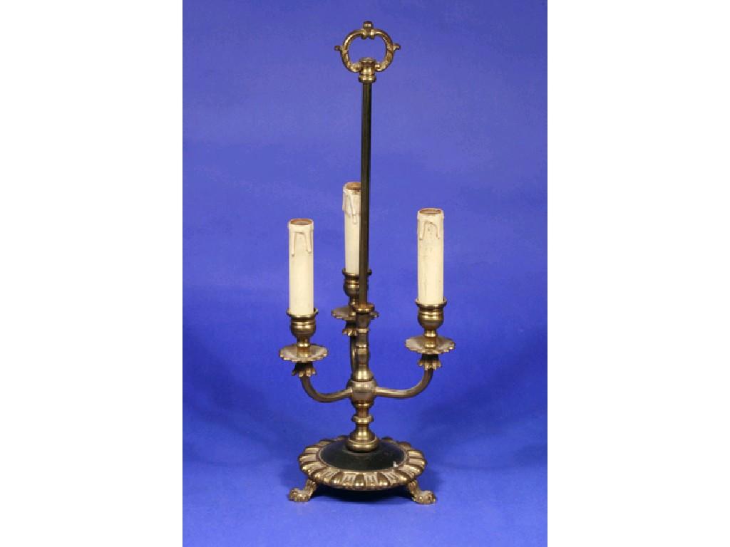 Appraisal: A THREE BRANCH EDWARDIAN STYLE CANDLE STAND with a central