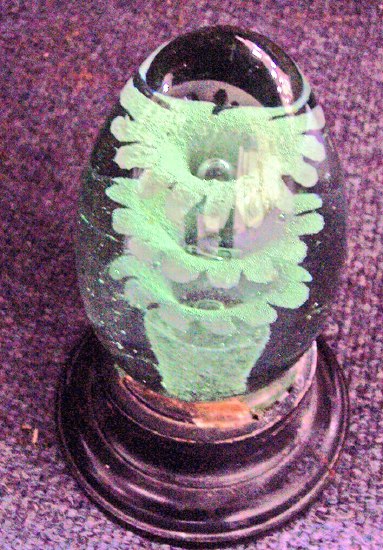 Appraisal: A green glass floral dump